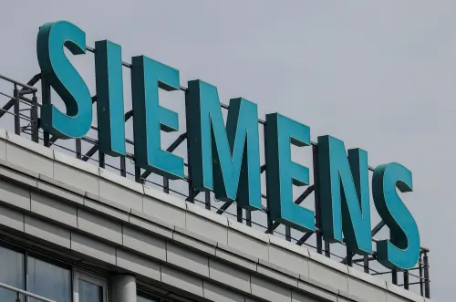 Siemens peut faire face aux tarifs douaniers, déclare le PDG, après des bénéfices du T1 dépassant les prévisions.
