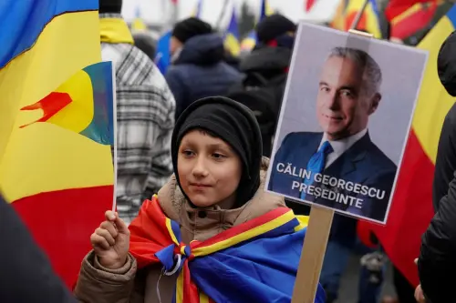 Le candidat d'extrême droite roumain Calin Georgescu contestera l'interdiction de se présenter aux élections